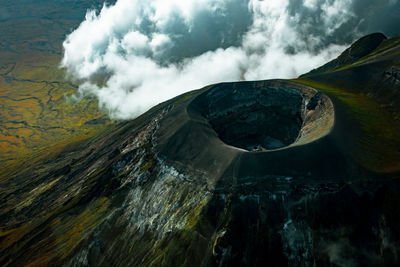 Panoramic view of volcanic mountain against sky