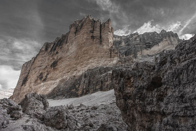 Rock formations on mountain against sky