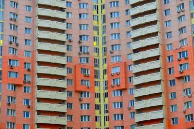 Low angle view of apartment building against sky