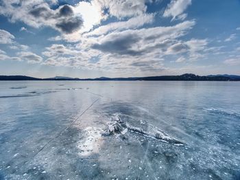 Frozen lake. studying of climatic and weather changes. piece of ice with light reflections.