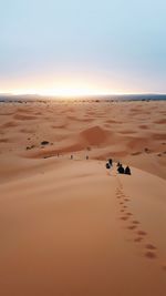 Scenic view of desert against clear sky