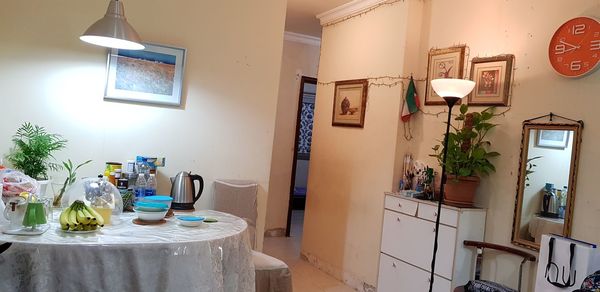 Potted plants on table at home