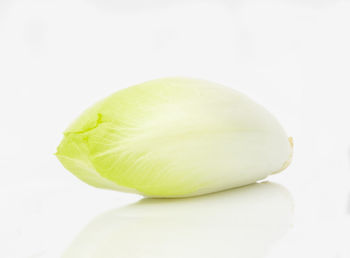 Close-up of apple against white background