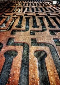 High angle view of text on footpath