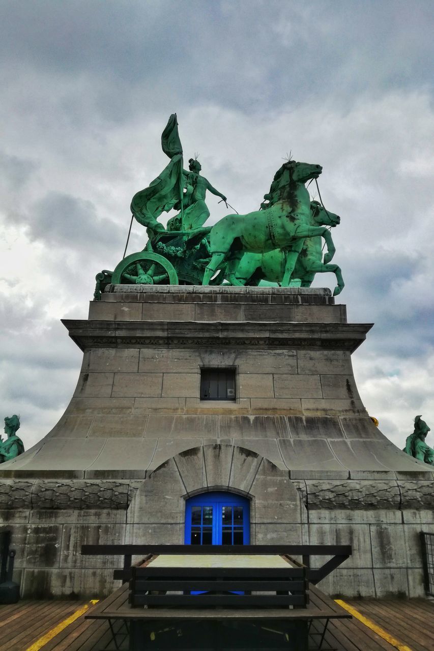 LOW ANGLE VIEW OF STATUE OF BUILDING