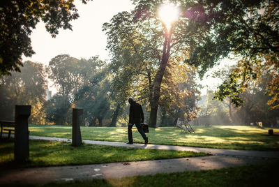 Person walking on footpath at park