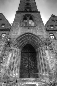 Exterior of historic church against sky