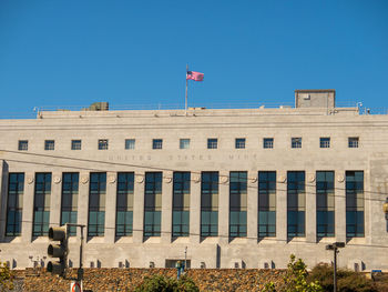 Low angle view of building against blue sky