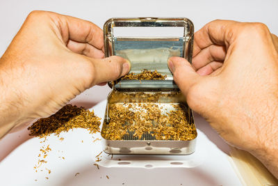 Close-up of man holding ice cream