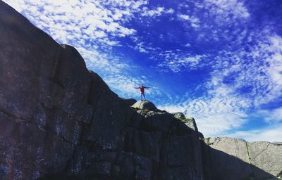 Scenic view of mountains against cloudy sky