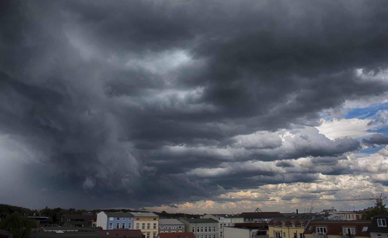 CITYSCAPE AGAINST STORM CLOUDS