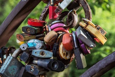 Close-up of padlocks on railing