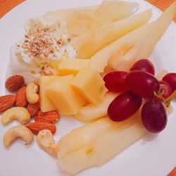 High angle view of grapes in plate