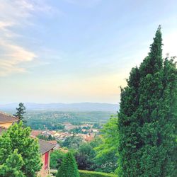 Scenic view of townscape against sky