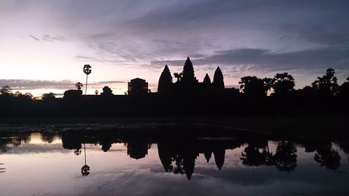 Silhouette of temple against sky during sunset