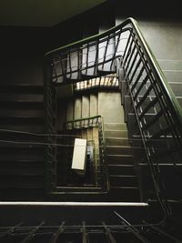 Low angle view of spiral staircase in building