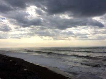 Scenic view of sea against sky at sunset