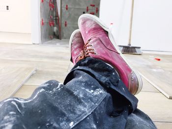 Low section of person wearing shoes