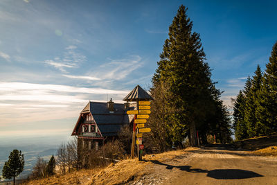 Scenic view of trees and houses against sky. schockl mountain., graz