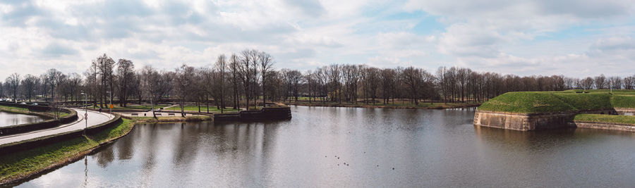 Scenic view of river against sky
