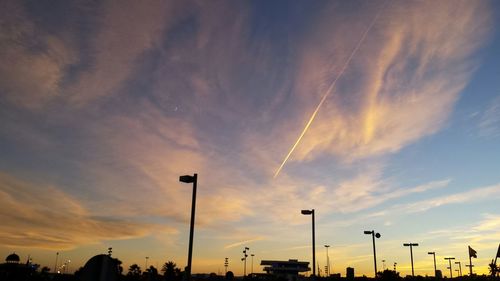 Low angle view of cloudy sky at sunset