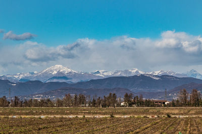 Scenic view of snowcapped mountains against sky