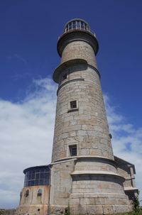 Low angle view of lighthouse against sky