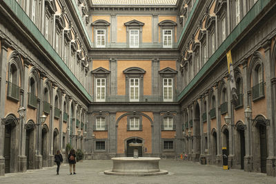 Between history and romance. a tour between the centuries in the atrium of palazzo reale in naples.