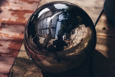 High angle view of crystal ball on table