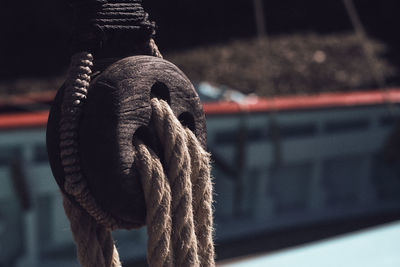 Close-up of rope tied to railing