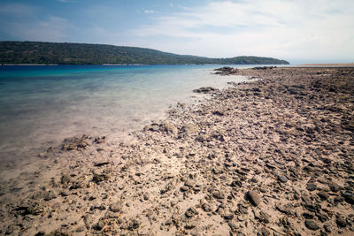 Scenic view of beach against sky