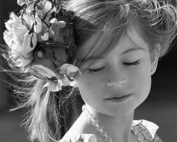 Close-up of cute girl wearing headwear looking away