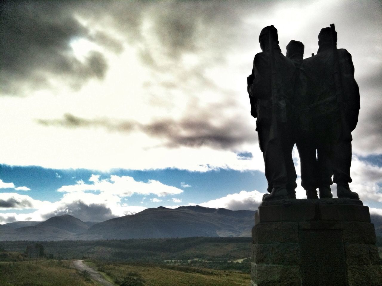 sky, cloud - sky, cloudy, cloud, mountain, landscape, tranquility, statue, sculpture, nature, tranquil scene, history, travel destinations, scenics, rock - object, human representation, ancient, outdoors, the past