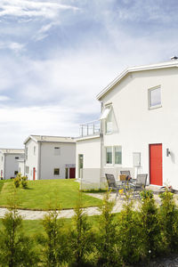 House on field against sky