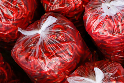 Full frame shot of red chili peppers for sale in market