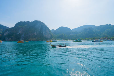 Scenic view of boats in bay