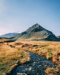 Scenic view of mountains against clear sky