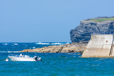 Scenic view of sea against clear sky