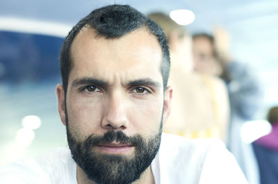 Close-up portrait of bearded man