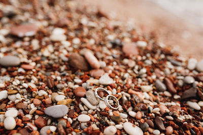 Close-up of stones on sand