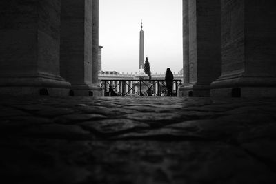 People in front of historical building