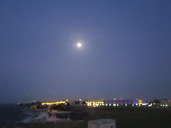 Illuminated cityscape at night