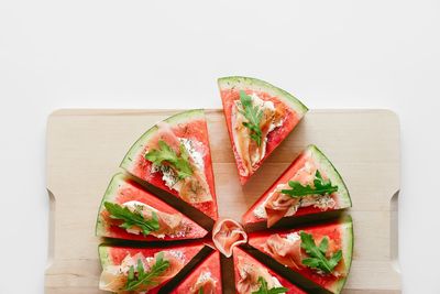 High angle view of fruits on cutting board