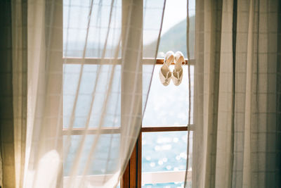 Low angle view of glass window at home