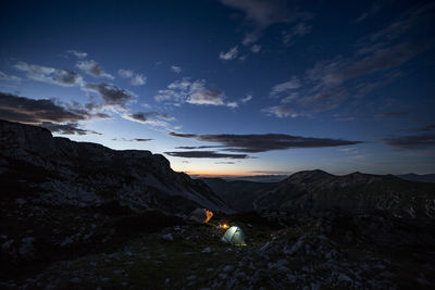 Scenic view of mountains against sky during sunset