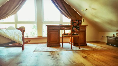 Chairs on hardwood floor at home