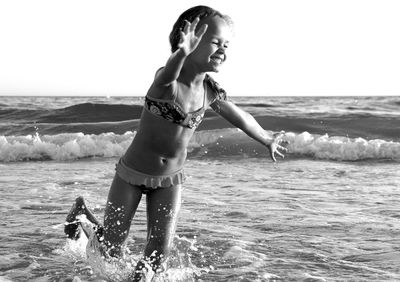 Woman running on beach