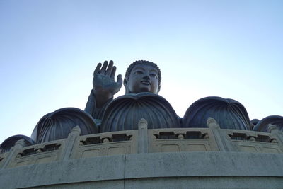 Low angle view of statue against clear sky