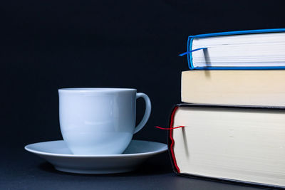 Close-up of coffee cup on table