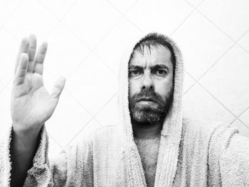 Portrait of man in bathroom